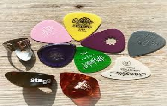 What is a tiny plastic piece used to strum a guitar?